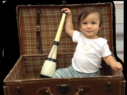 Imgage of child holding a juggling pin. Photo for Cirque Art Studio, North Miami Beach, FL.